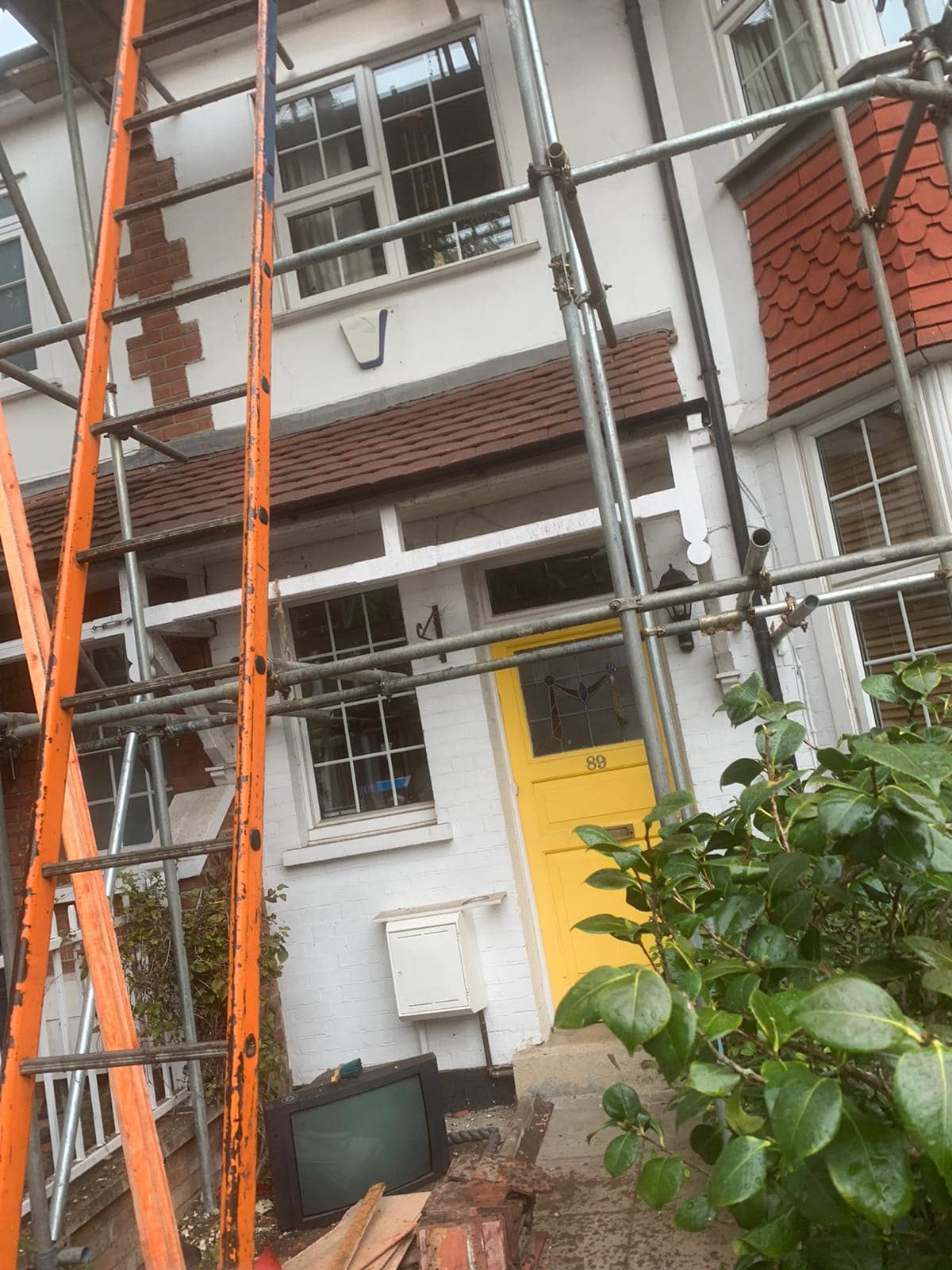 Professional roofers working on a property in London - KS Roof Master