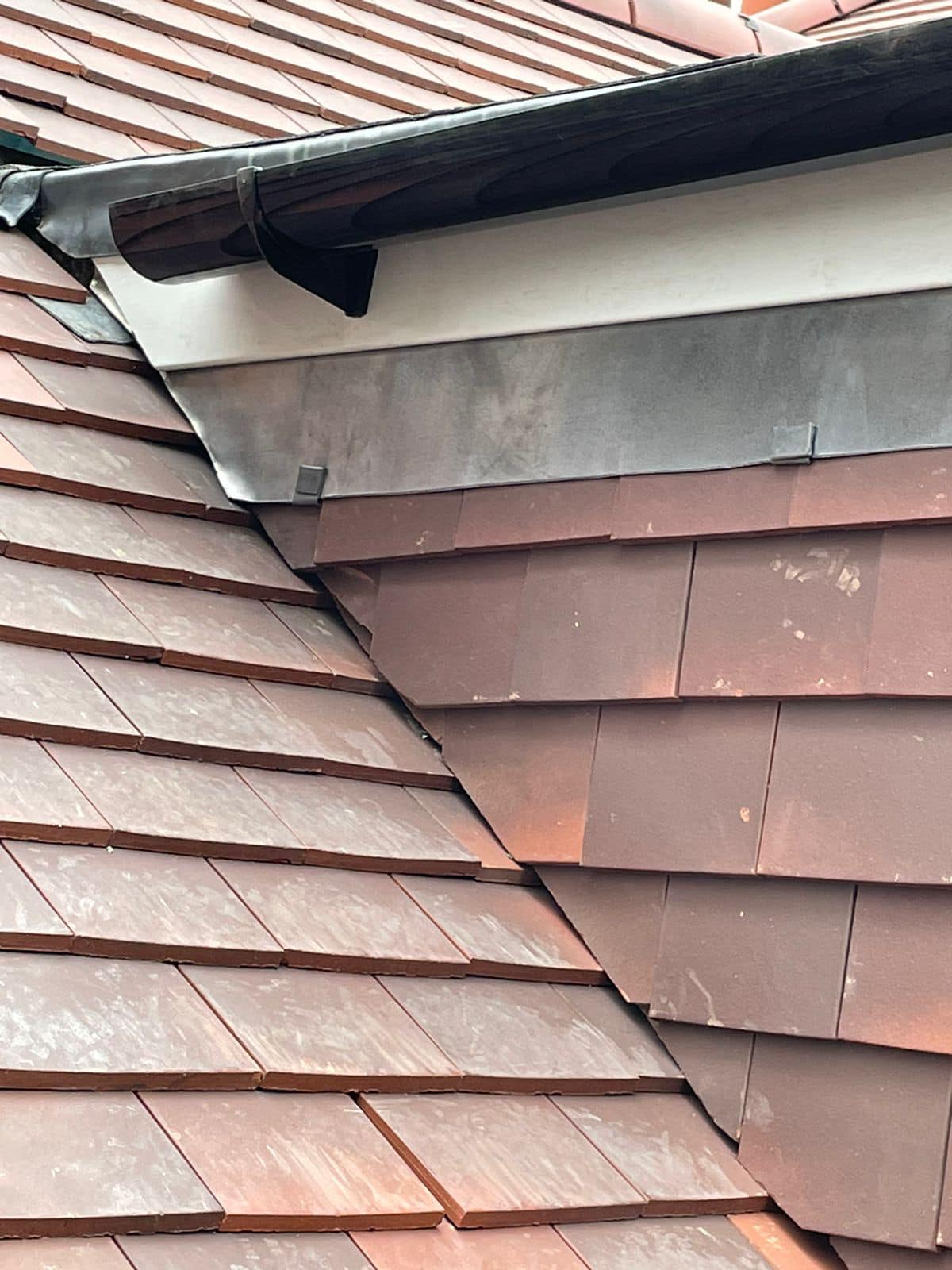 Professional roofers working on a property in London - KS Roof Master