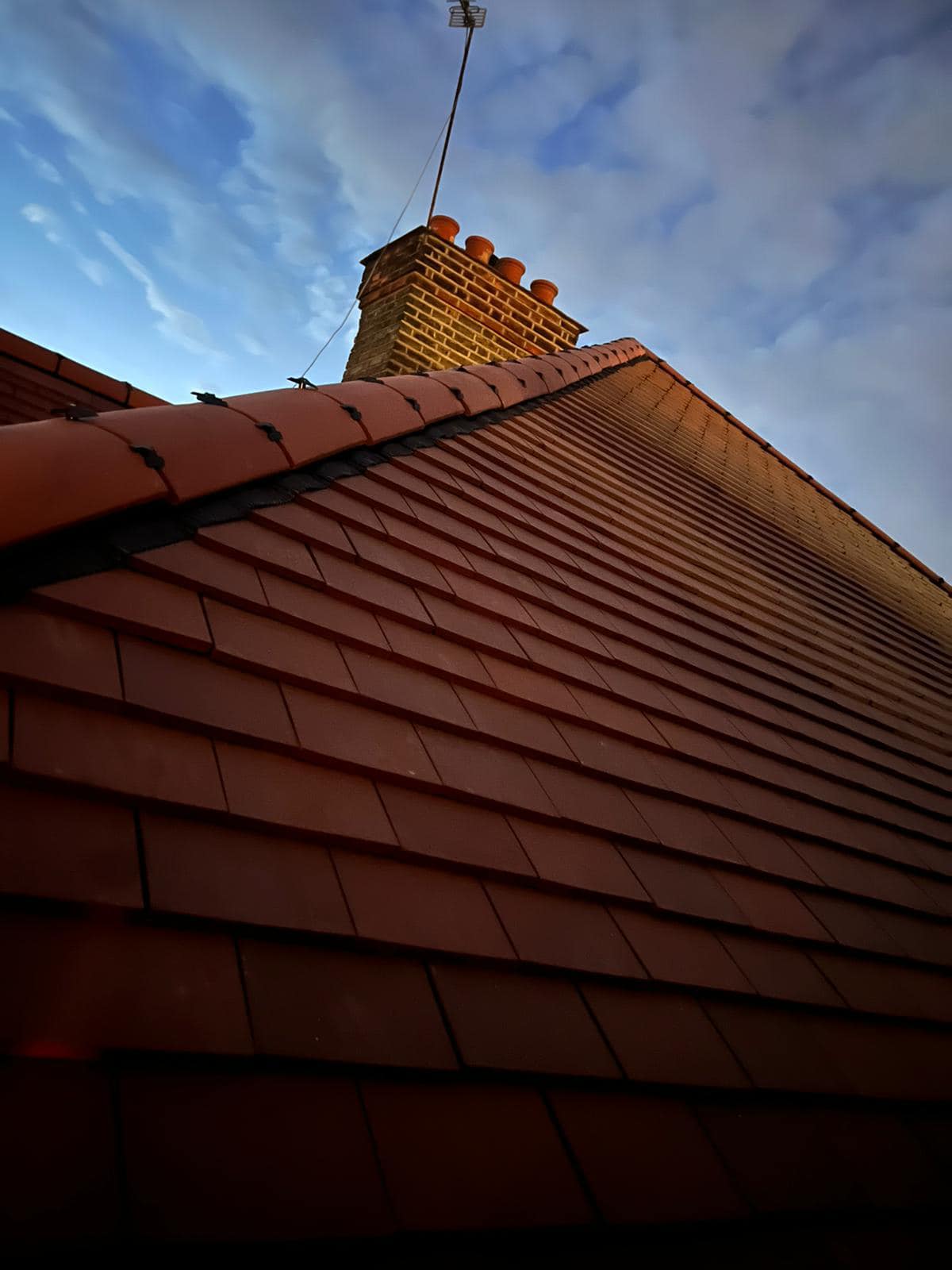 Professional roofers working on a property in London - KS Roof Master