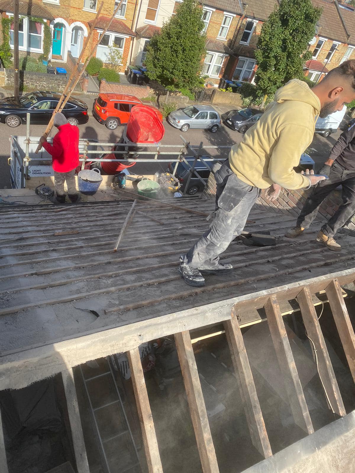Professional roofers working on a property in London - KS Roof Master