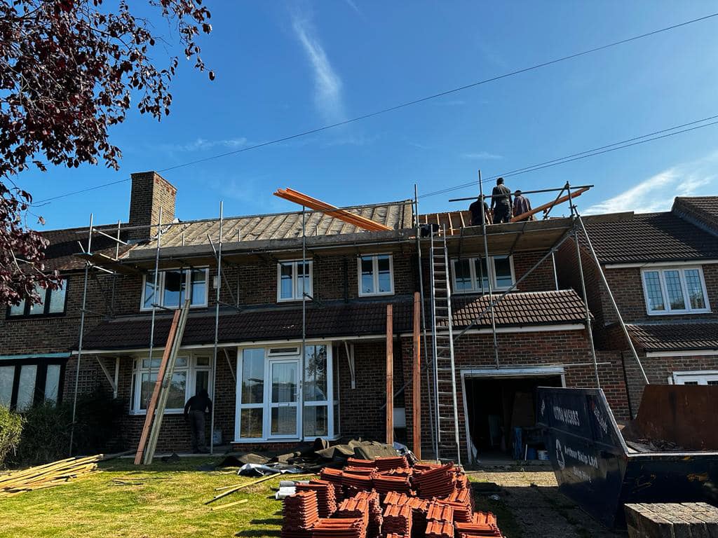 Professional roofers working on a property in London - KS Roof Master