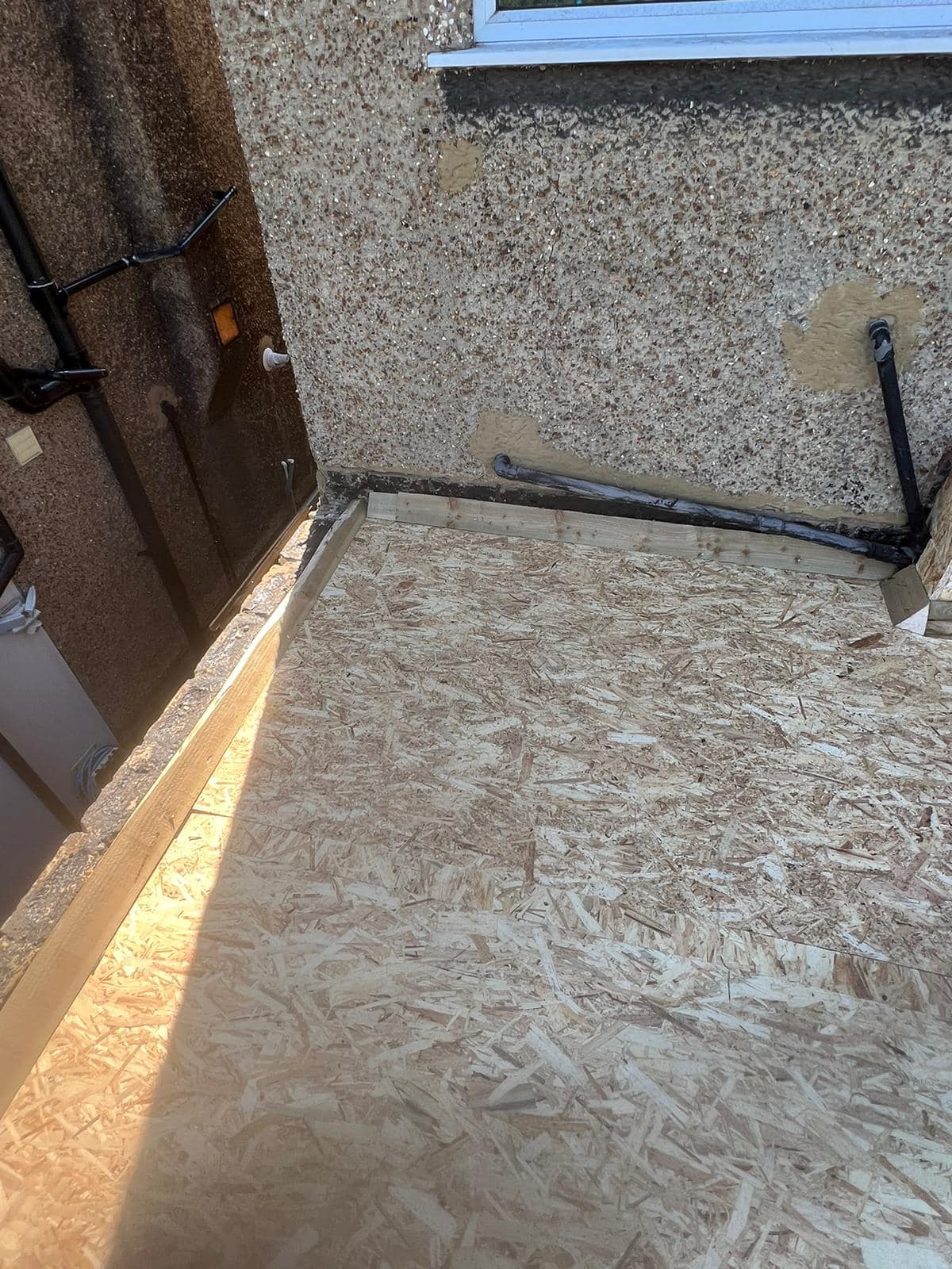 Professional roofers working on a property in London - KS Roof Master