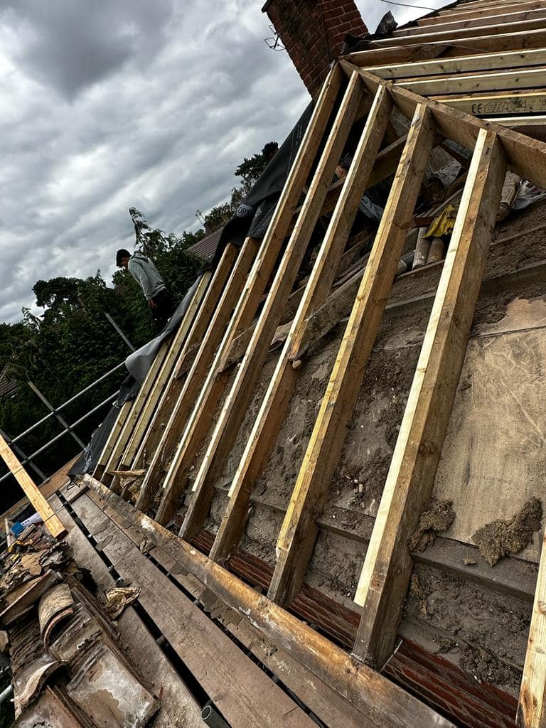 Professional roofers working on a property in London - KS Roof Master