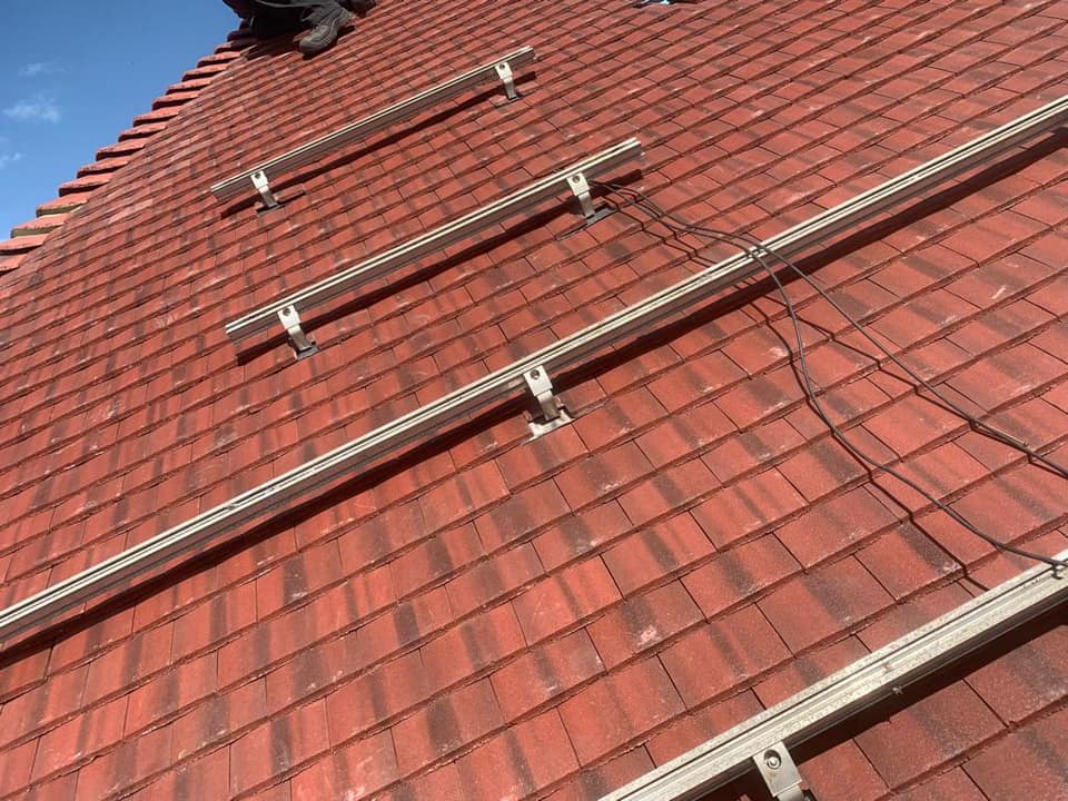 Professional roofers working on a property in London - KS Roof Master