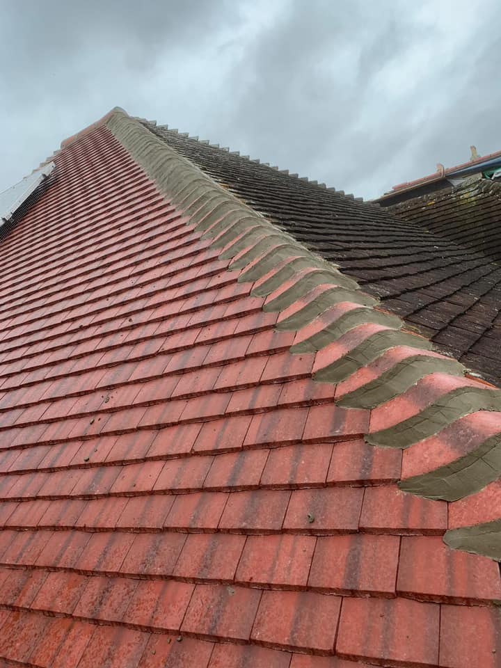 Professional roofers working on a property in London - KS Roof Master