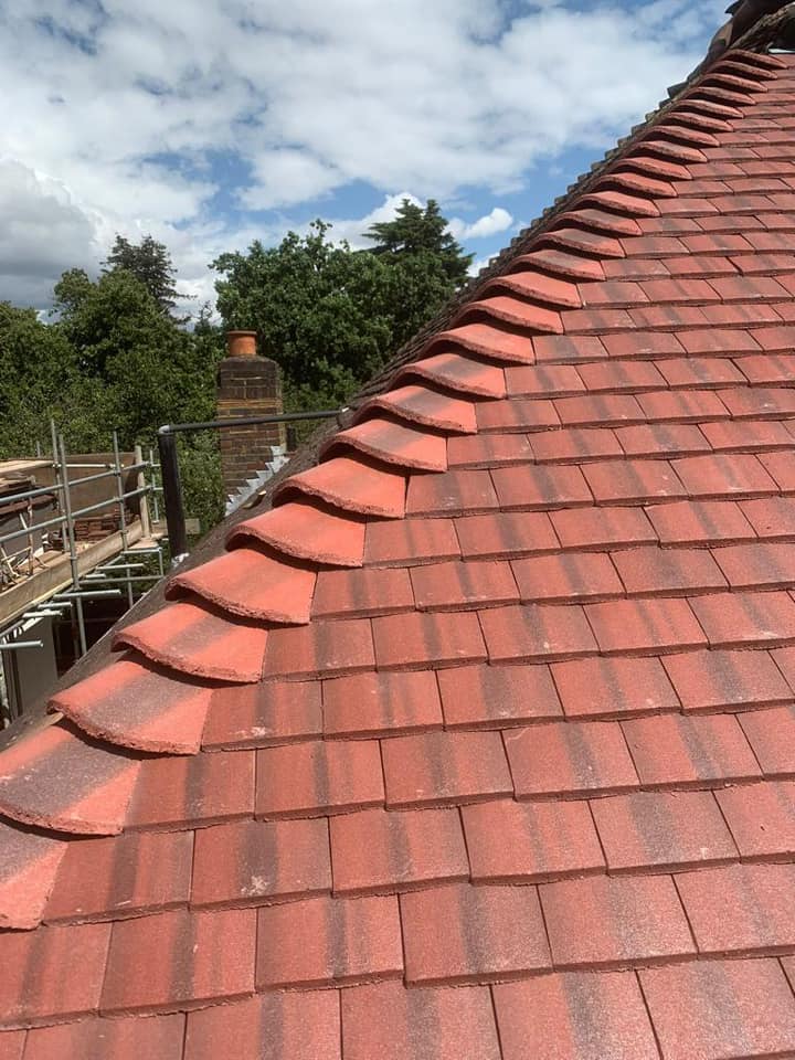 Professional roofers working on a property in London - KS Roof Master