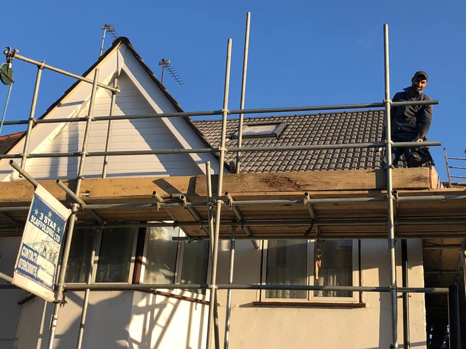 Professional roofers working on a property in London - KS Roof Master