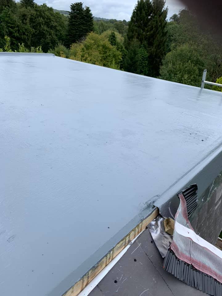 Professional roofers working on a property in London - KS Roof Master