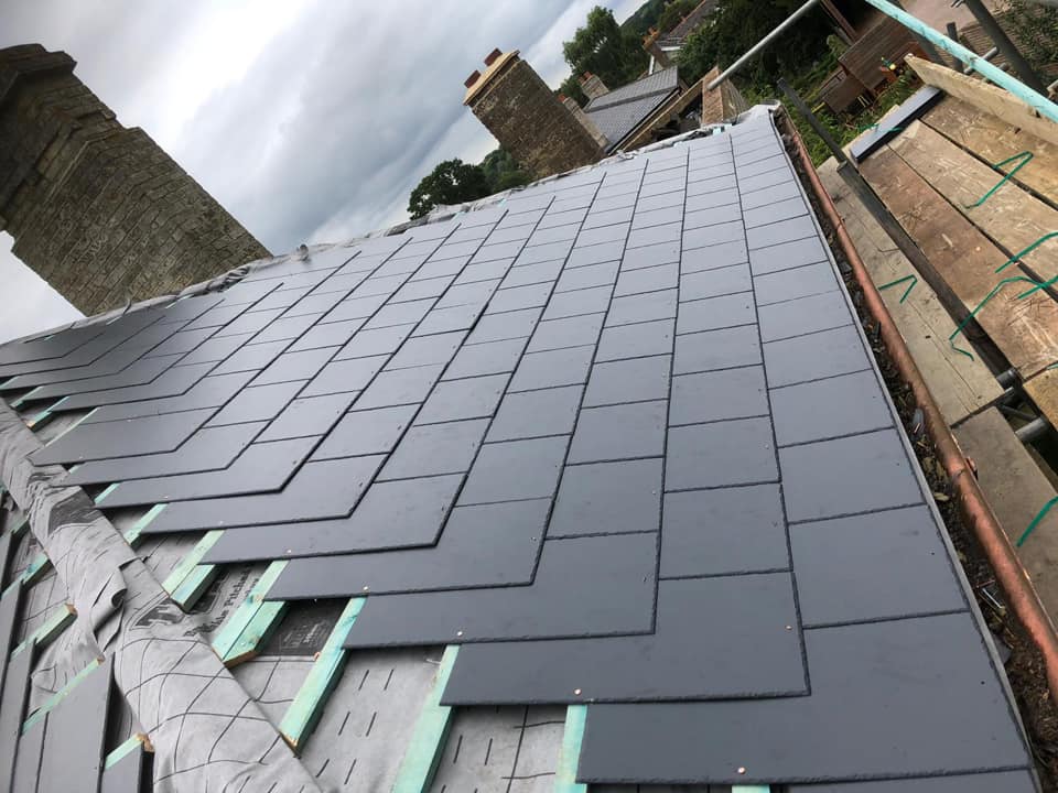 Professional roofers working on a property in London - KS Roof Master