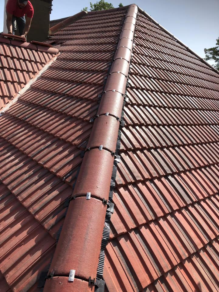 Professional roofers working on a property in London - KS Roof Master