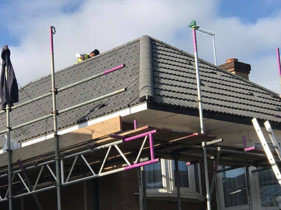 Professional roofers working on a property in London - KS Roof Master