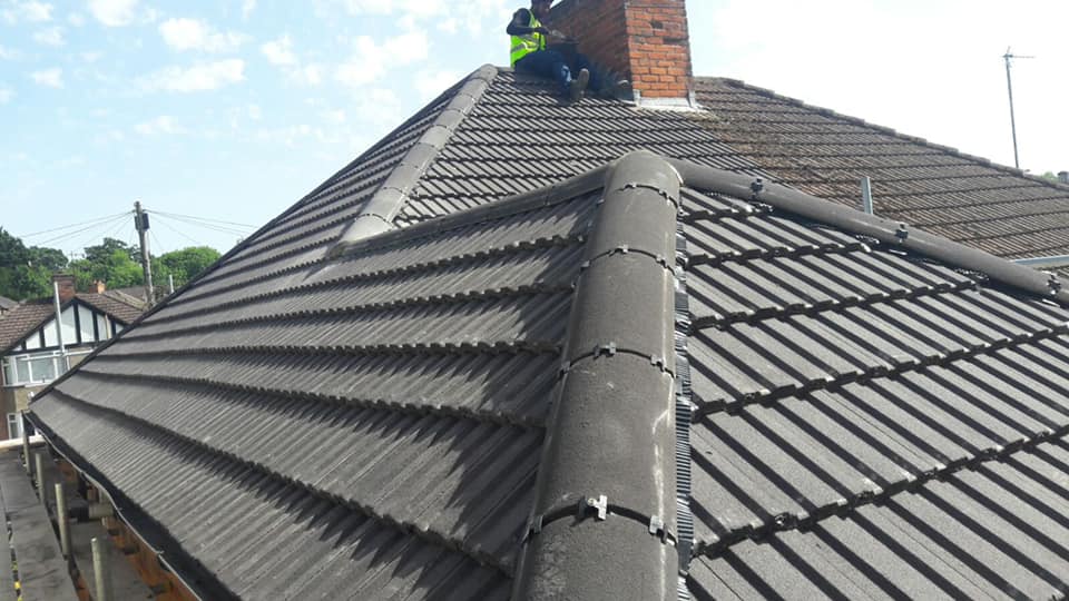 Professional roofers working on a property in London - KS Roof Master