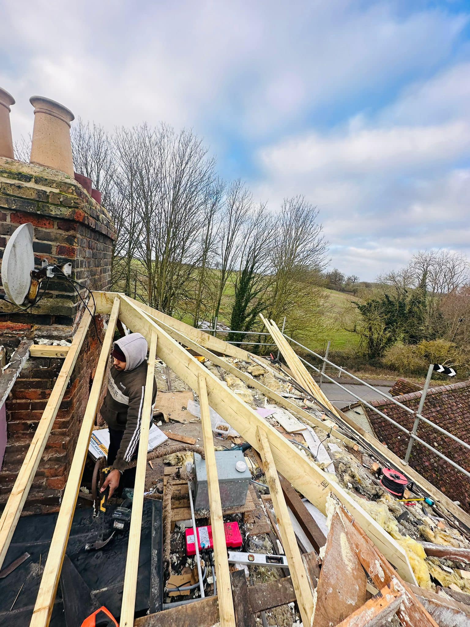 Professional roofers working on a property in London - KS Roof Master