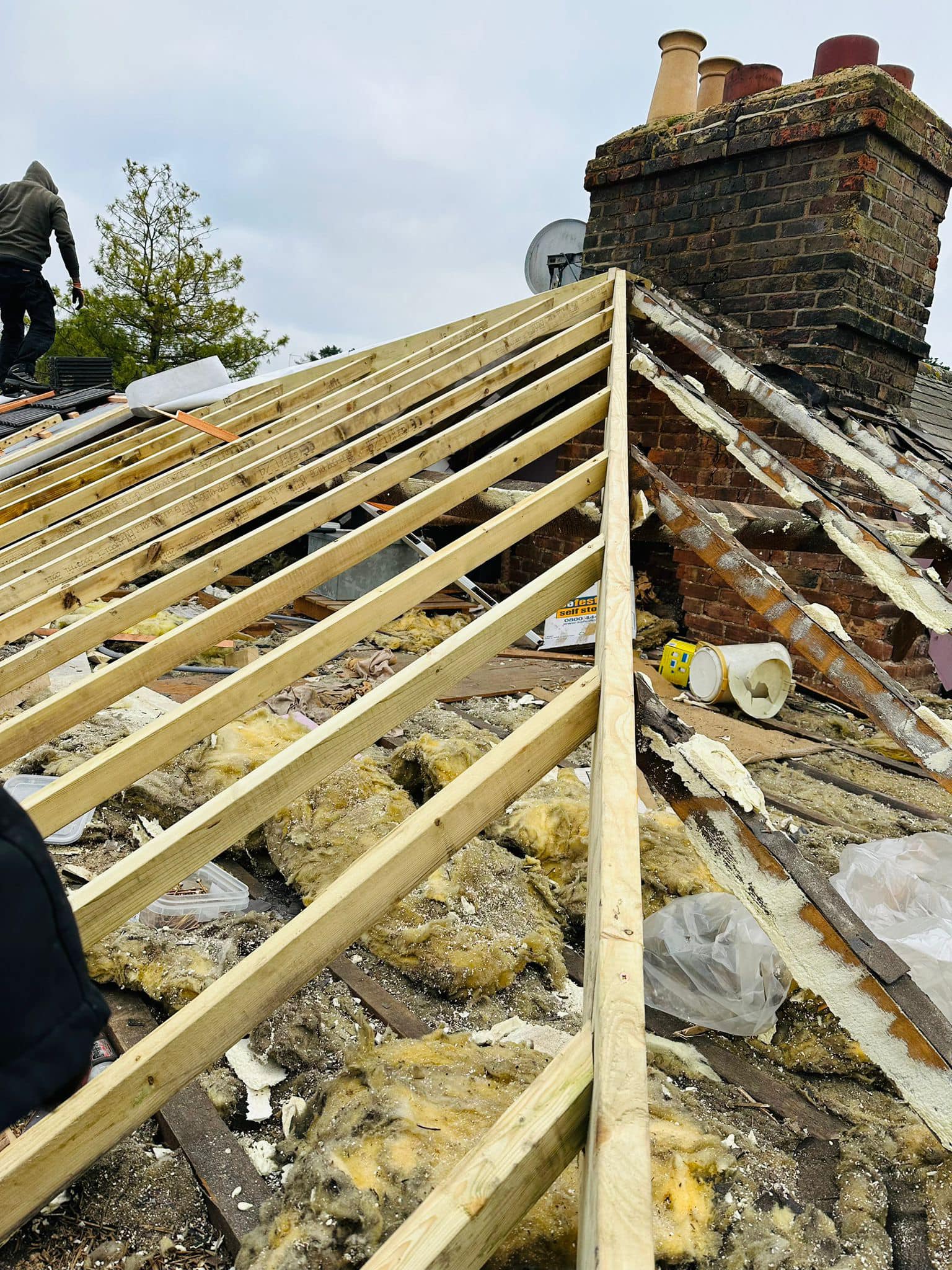 Professional roofers working on a property in London - KS Roof Master