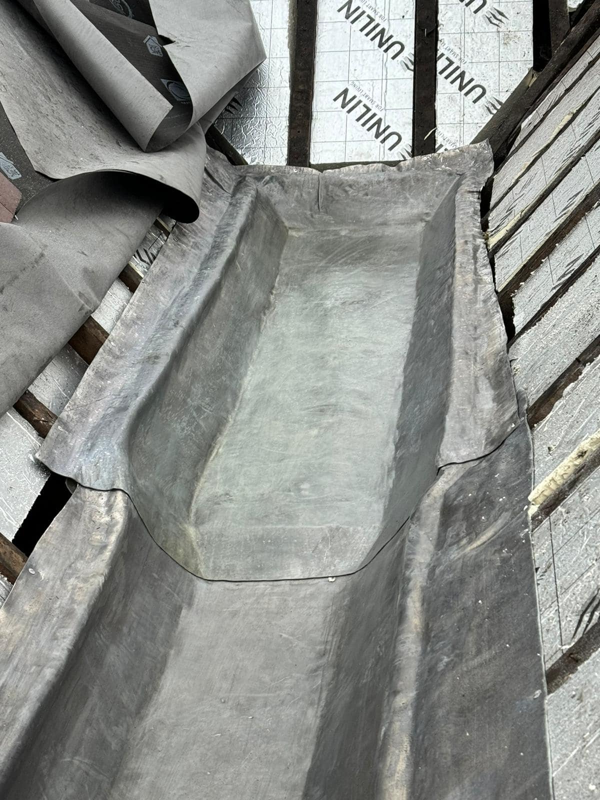 Professional roofers working on a property in London - KS Roof Master