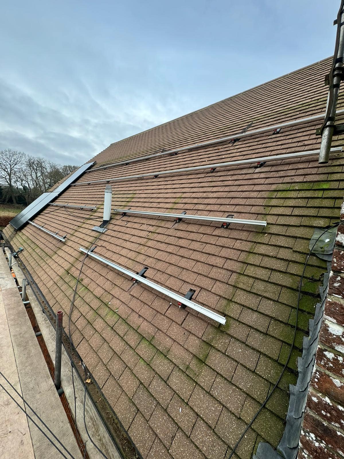 Professional roofers working on a property in London - KS Roof Master