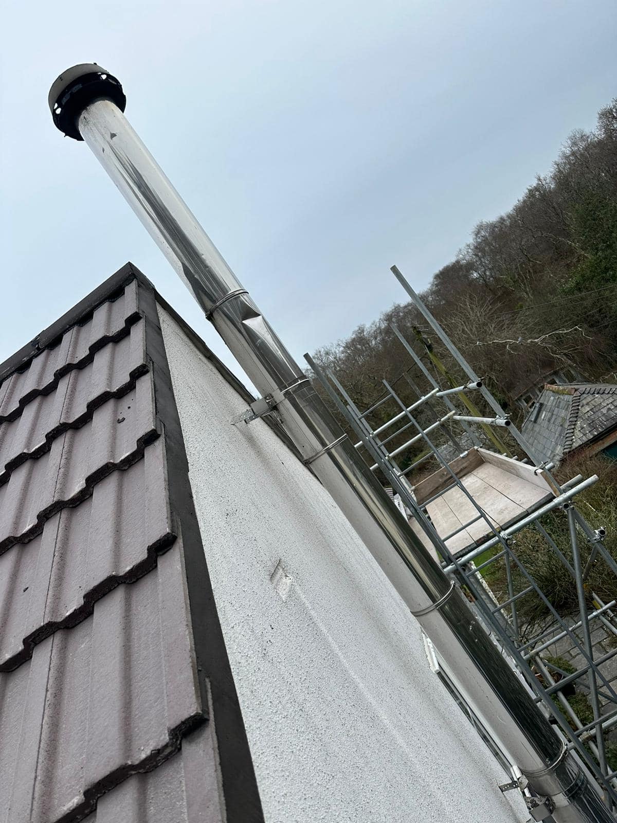 Professional roofers working on a property in London - KS Roof Master