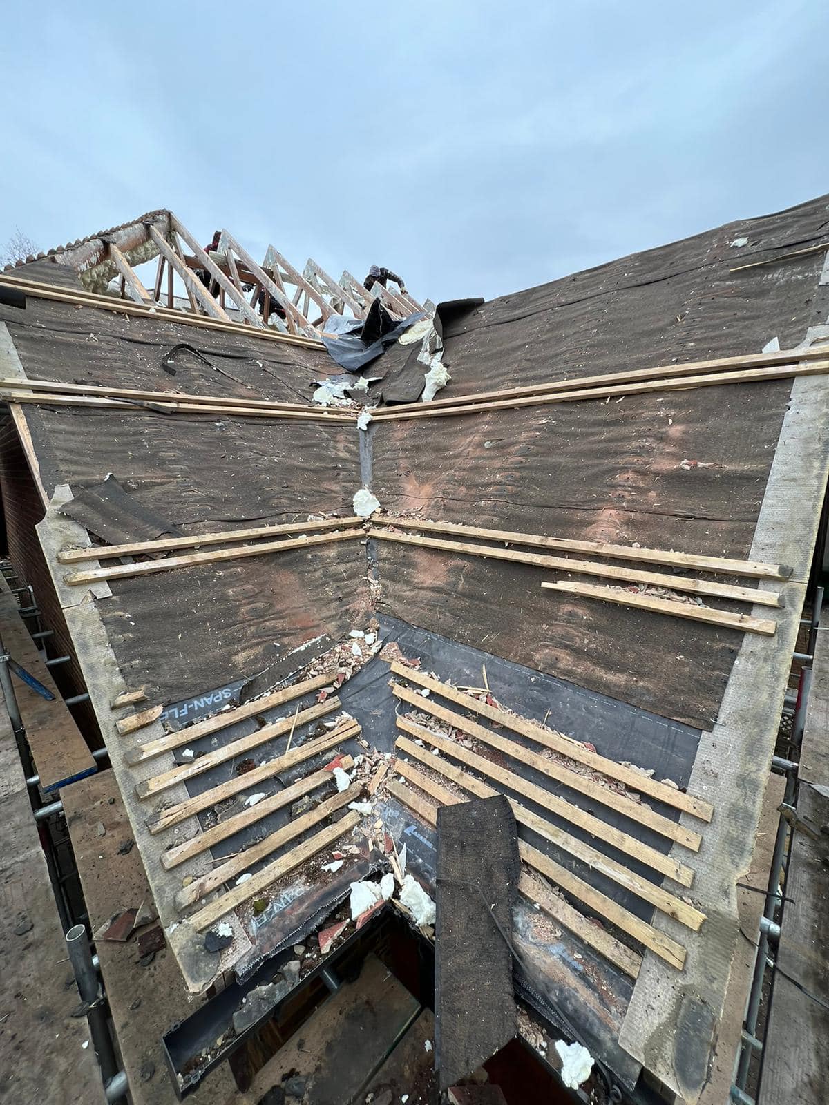 Professional roofers working on a property in London - KS Roof Master