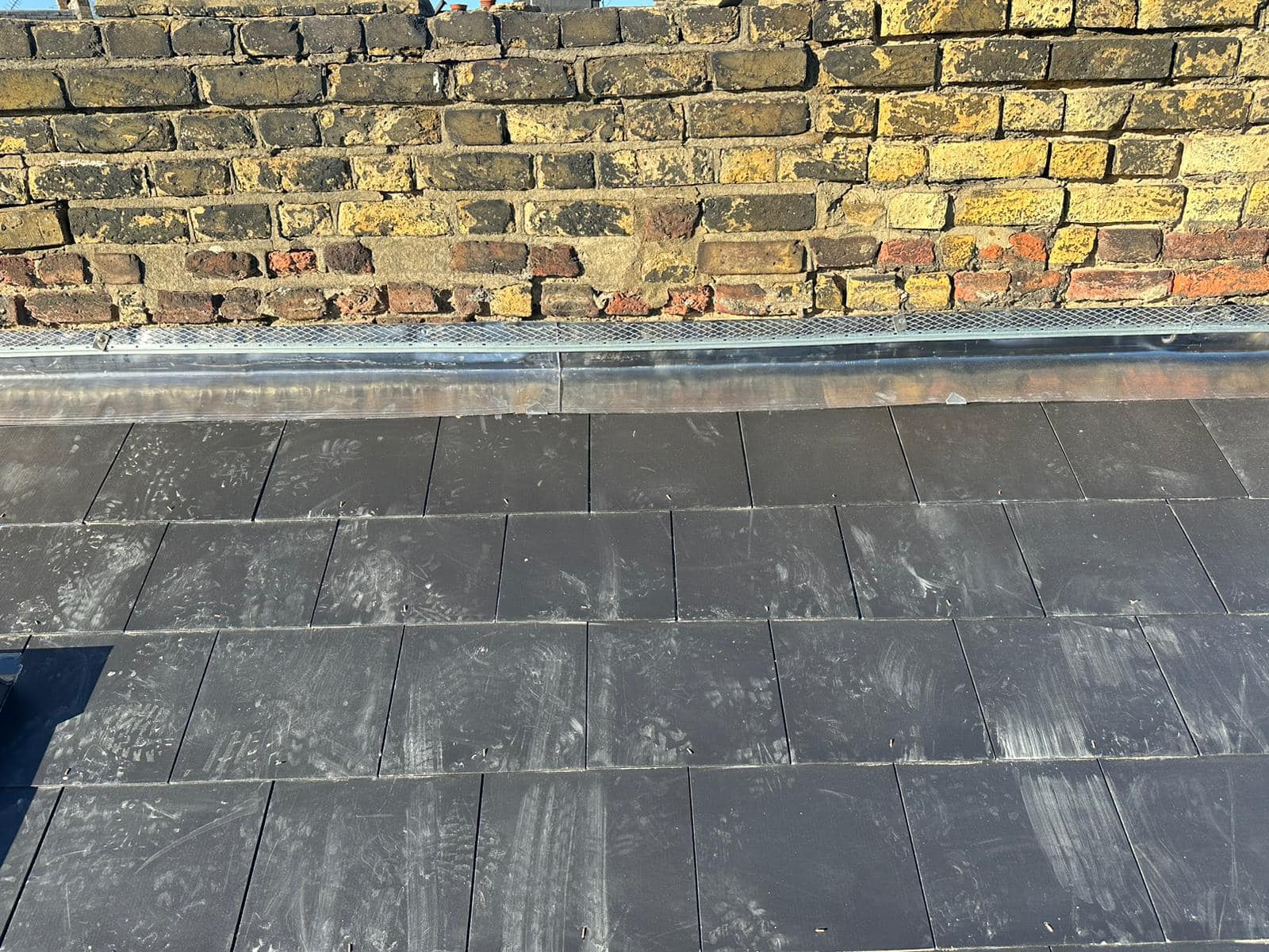 Slate roof restoration in Greenwich