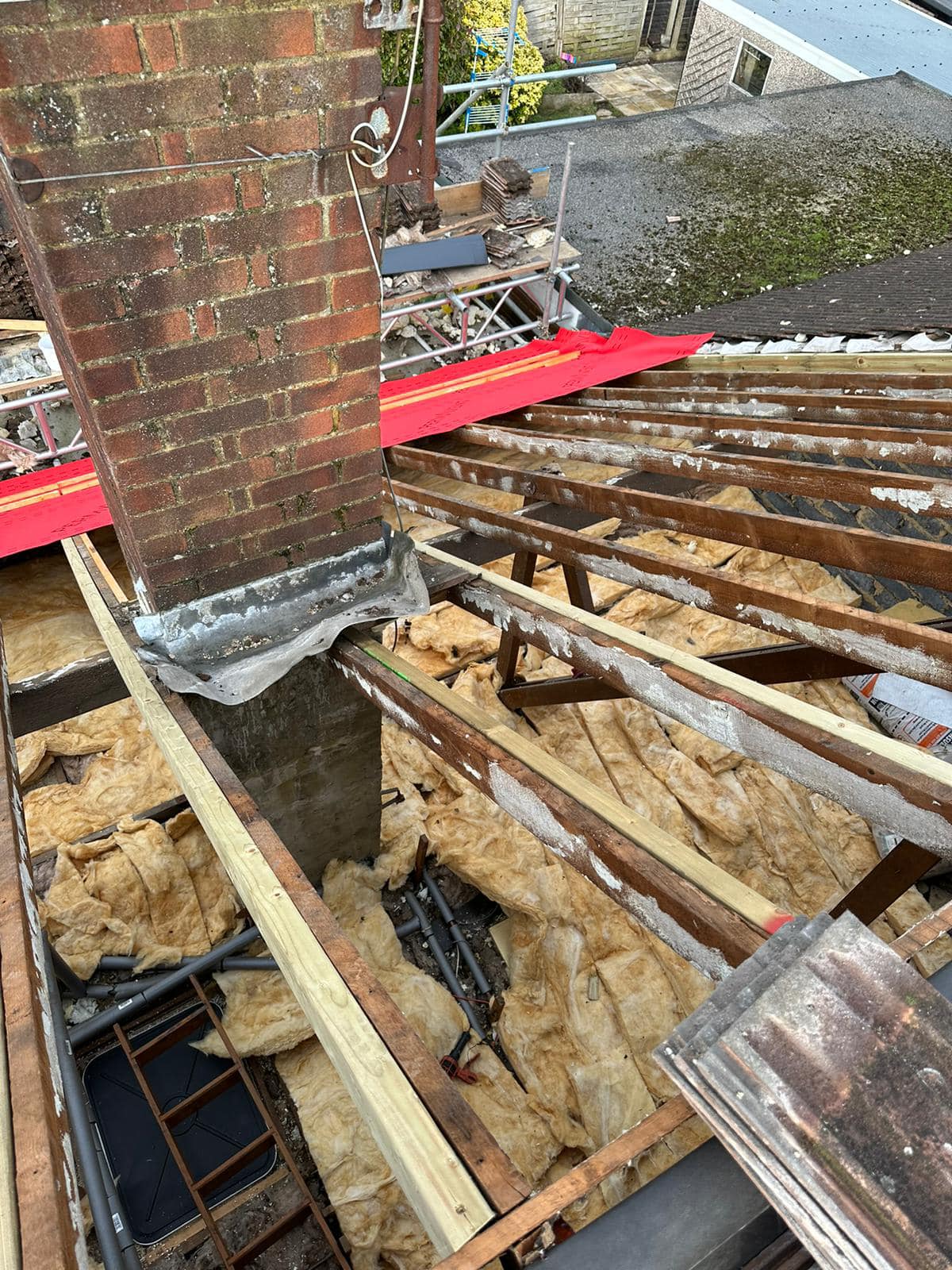 Professional roofers working on a property in London - KS Roof Master