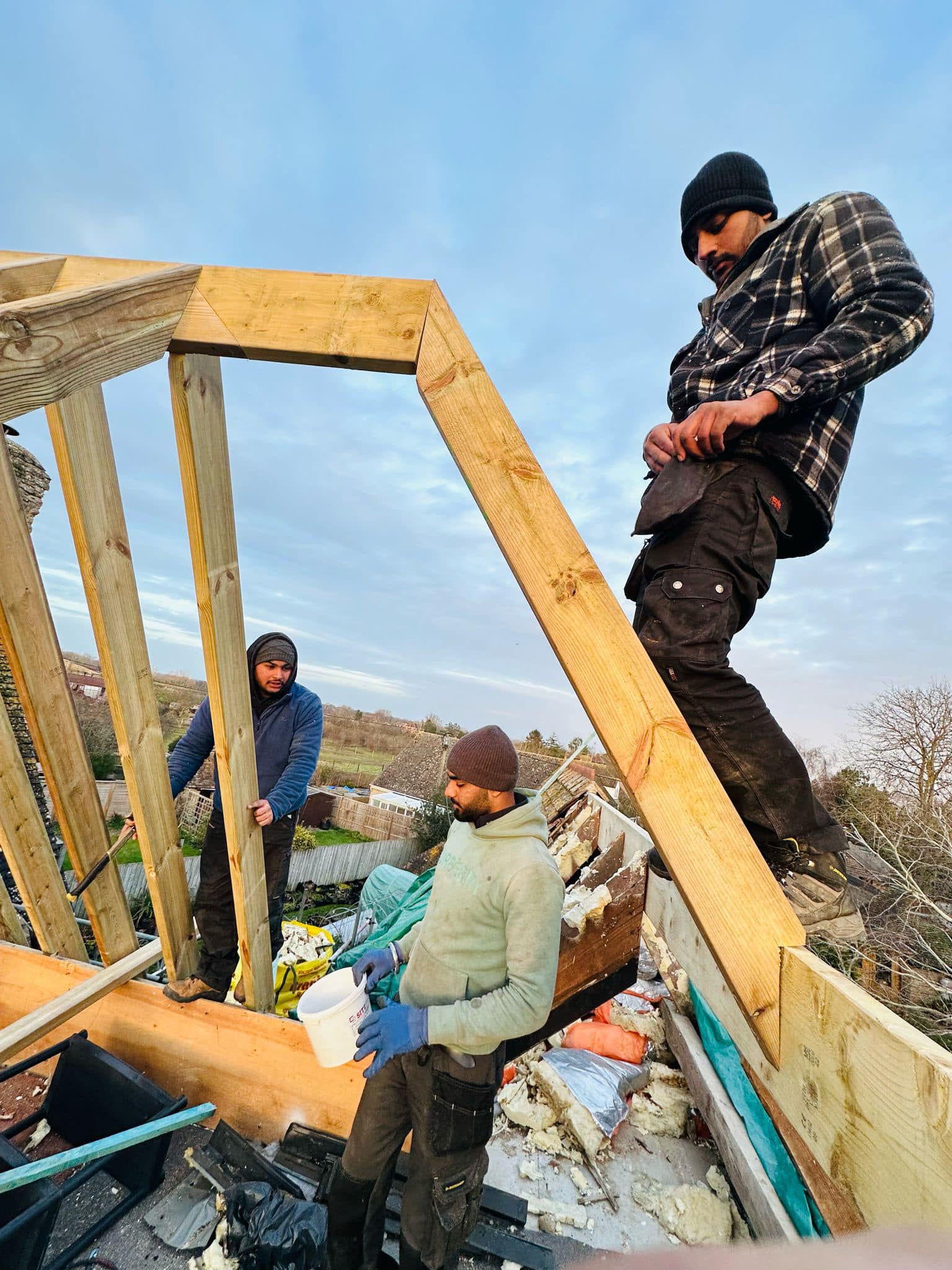 Professional roofers working on a property in London - KS Roof Master