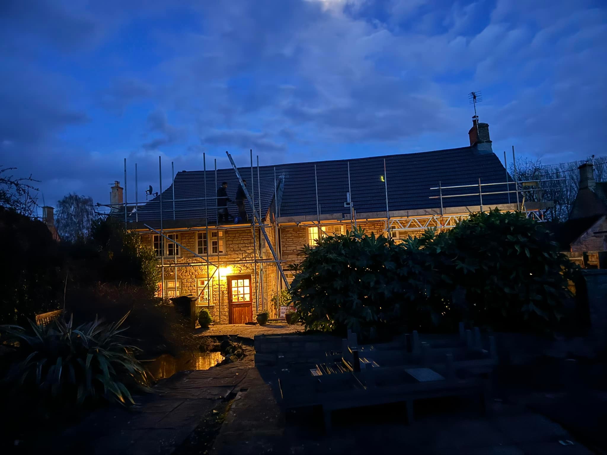 Professional roofers working on a property in London - KS Roof Master