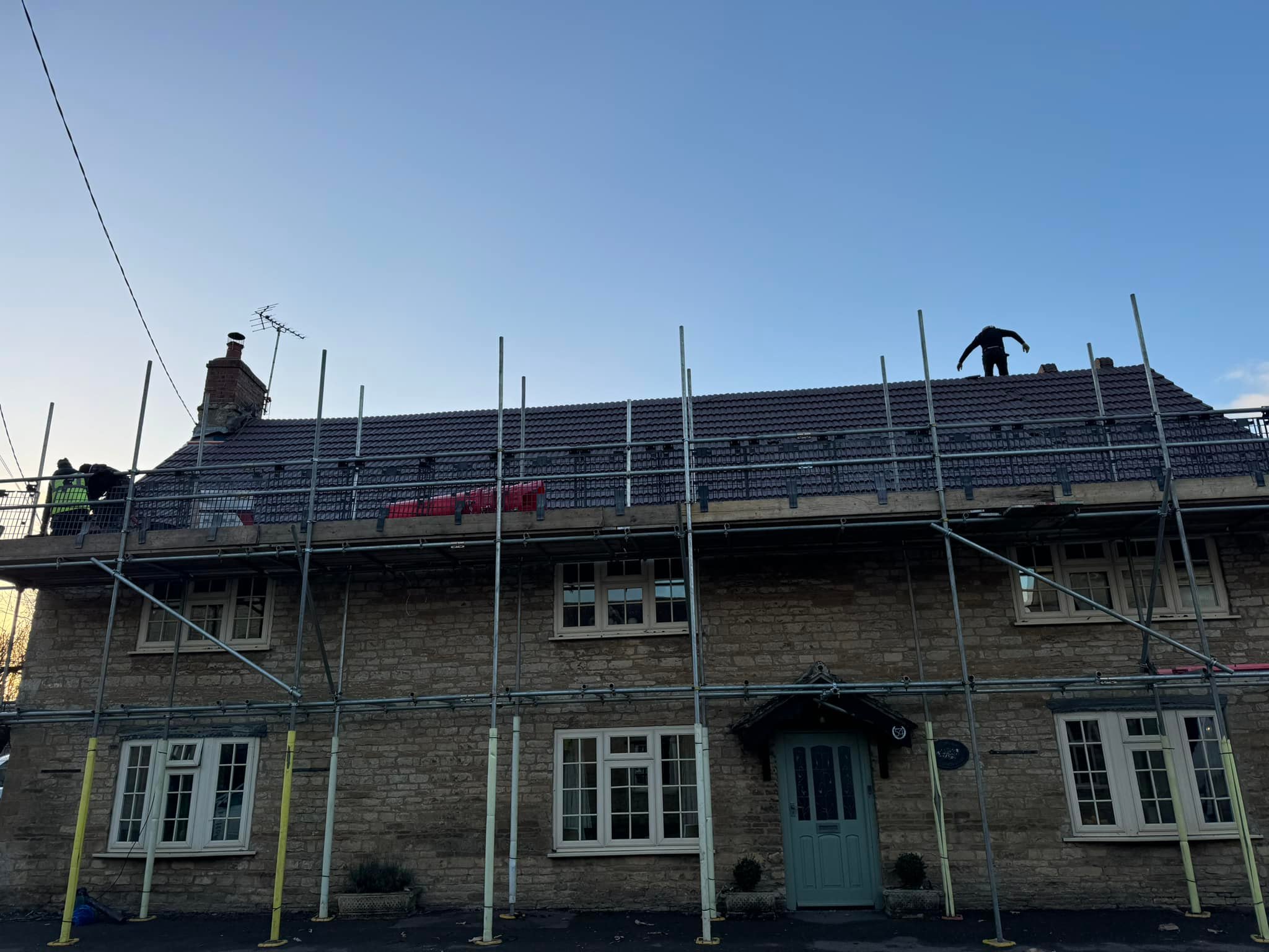 Professional roofers working on a property in London - KS Roof Master