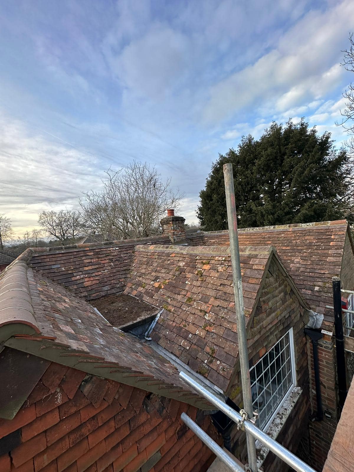 Professional roofers working on a property in London - KS Roof Master