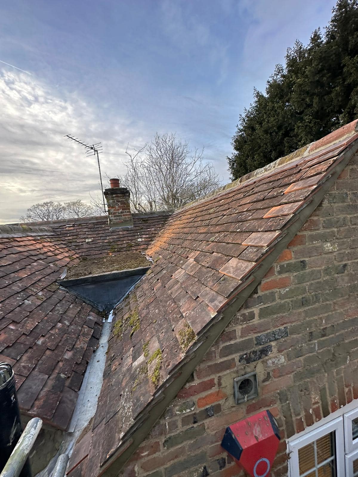 Professional roofers working on a property in London - KS Roof Master