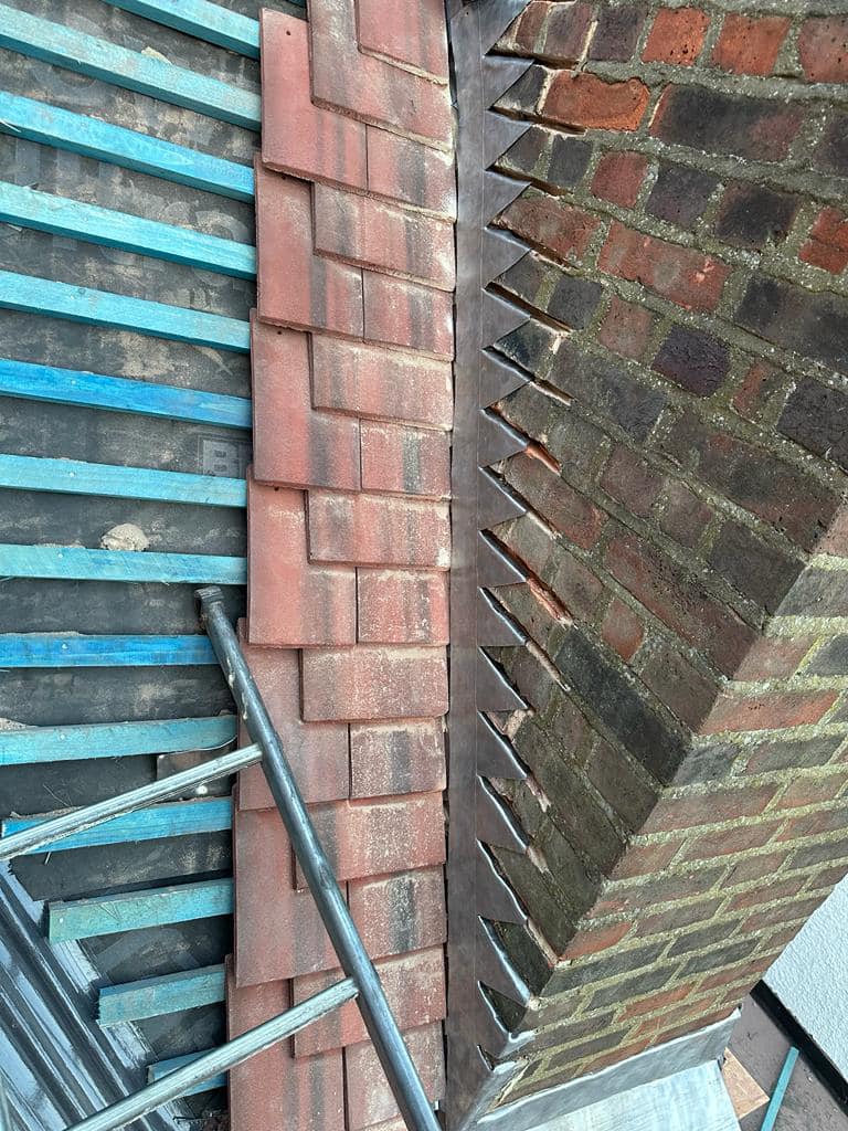 Professional roofers working on a property in London - KS Roof Master