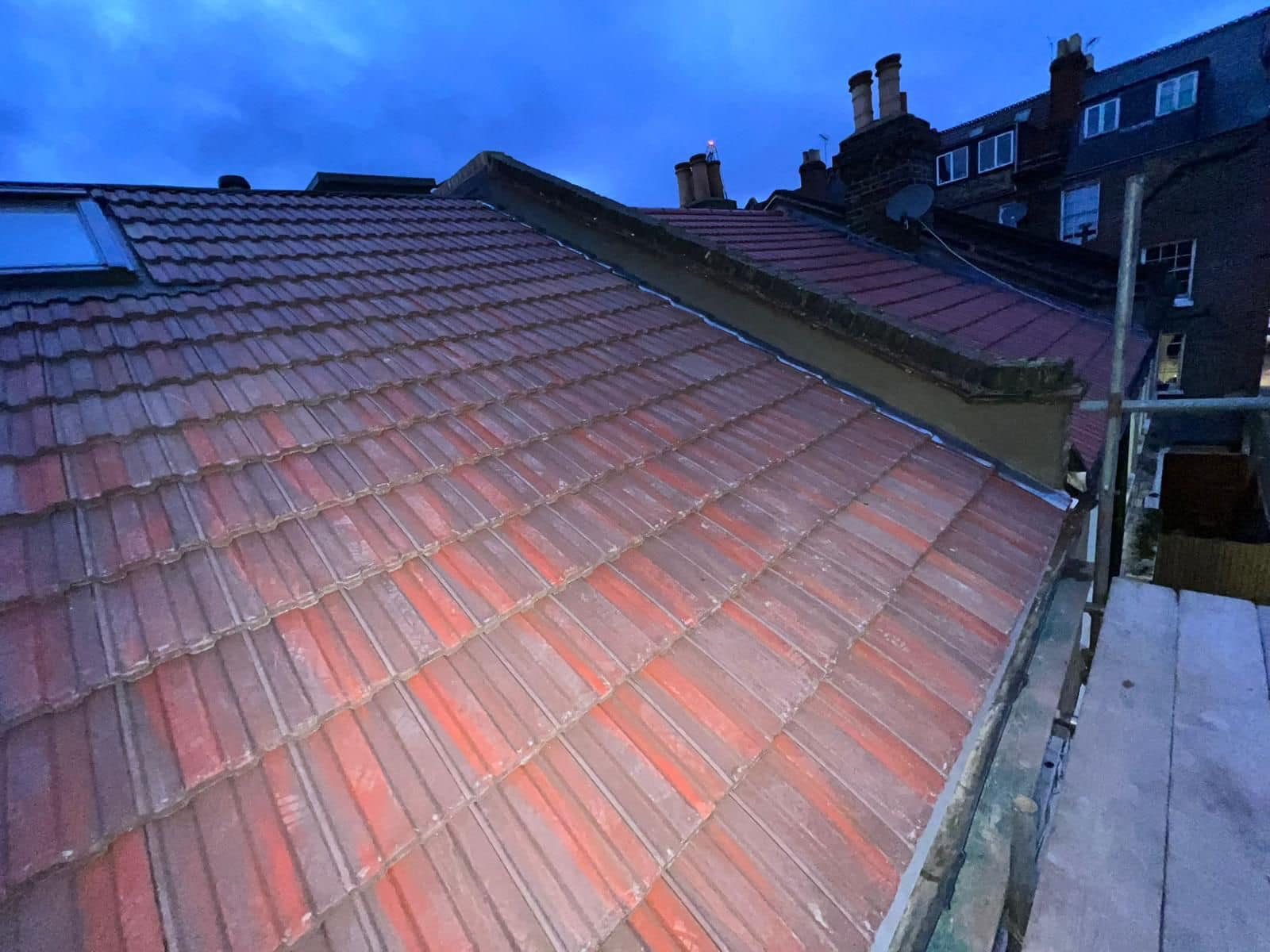 Professional roofers working on a property in London - KS Roof Master