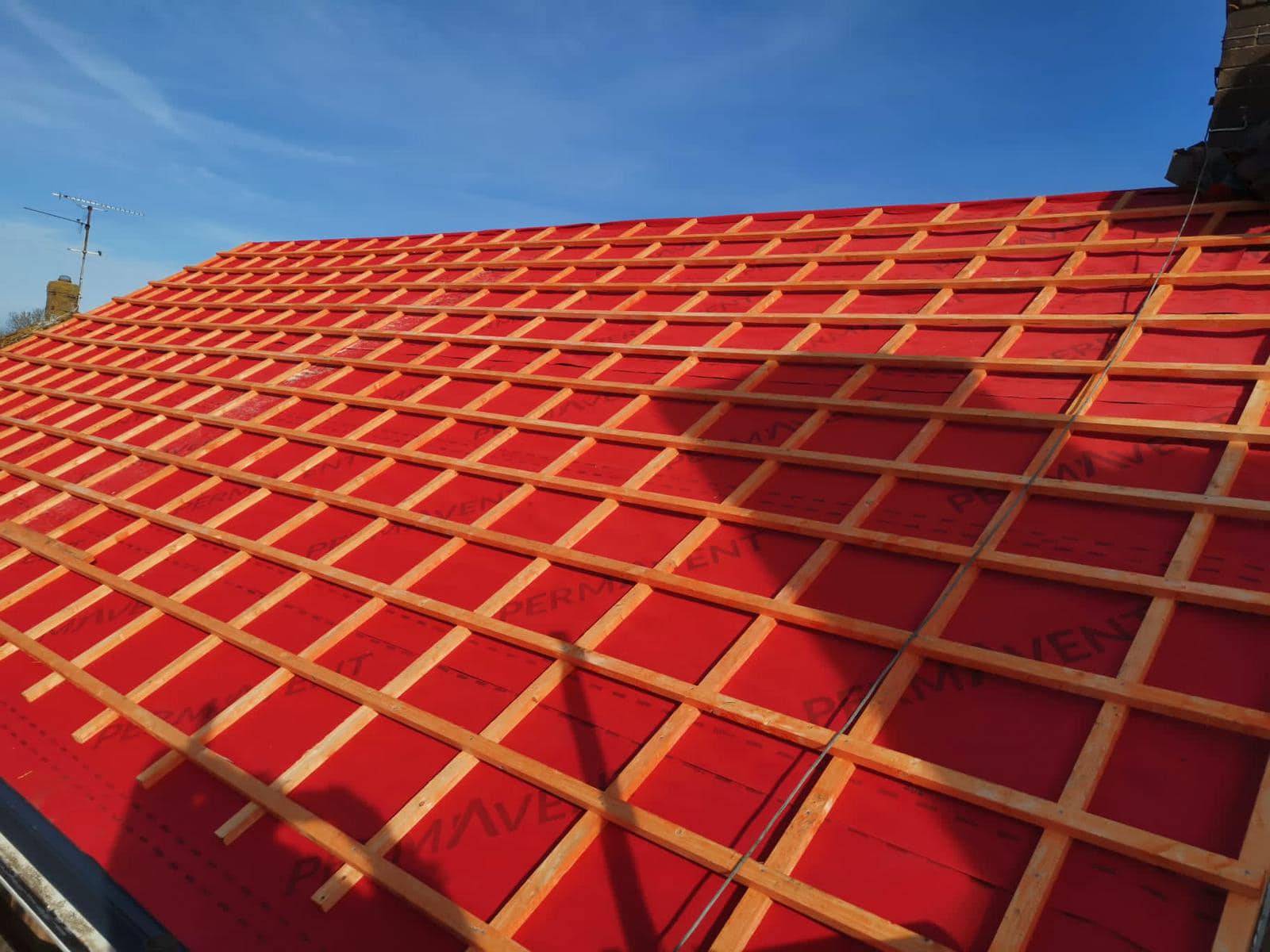 Professional roofers working on a property in London - KS Roof Master