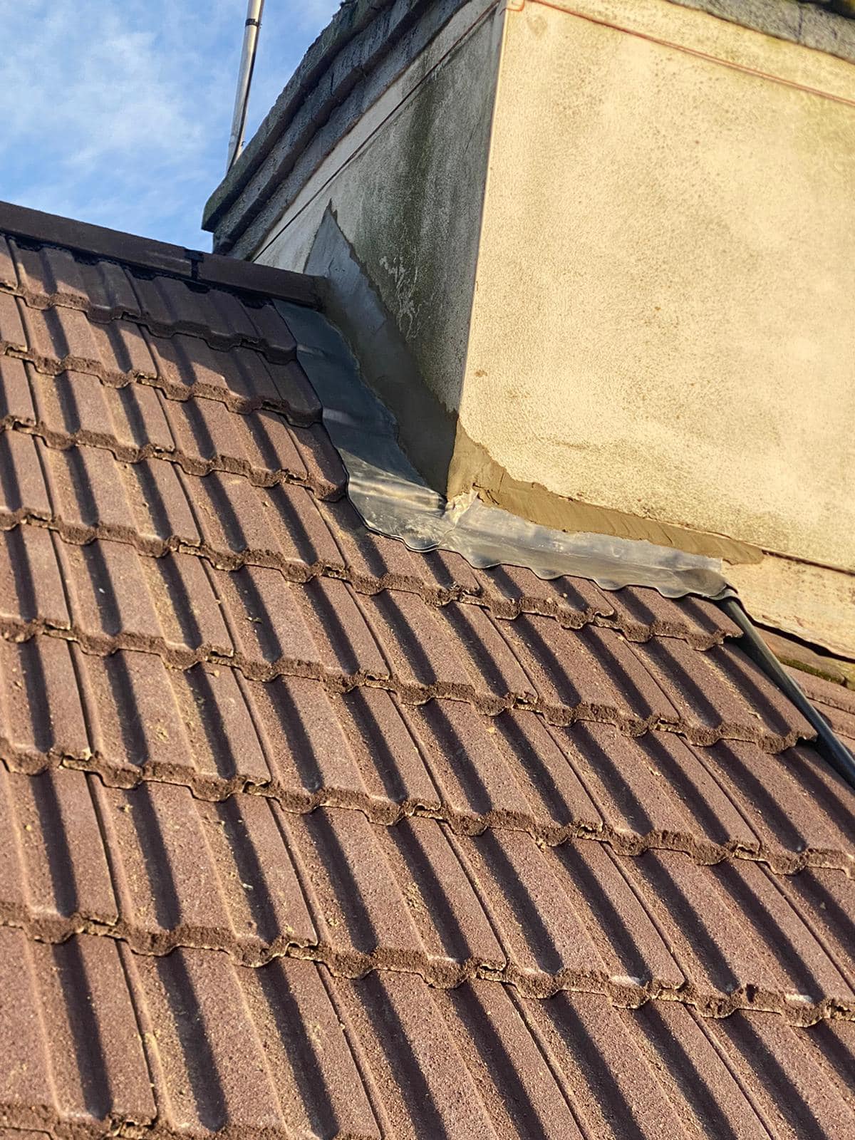 Professional roofers working on a property in London - KS Roof Master