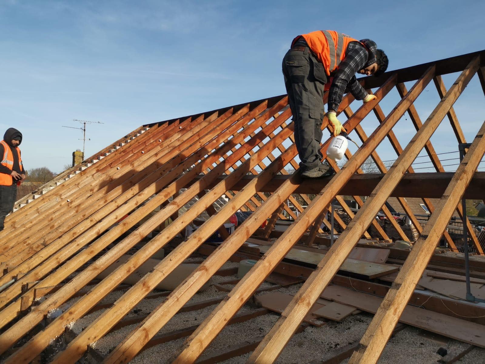 Professional roofers working on a property in London - KS Roof Master