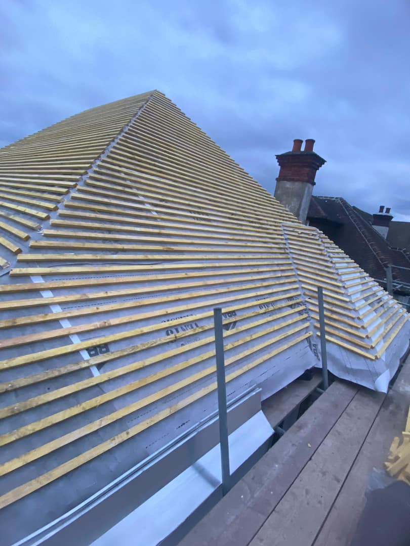 Professional roofers working on a property in London - KS Roof Master