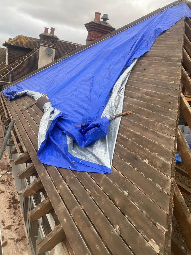 Professional roofers working on a property in London - KS Roof Master