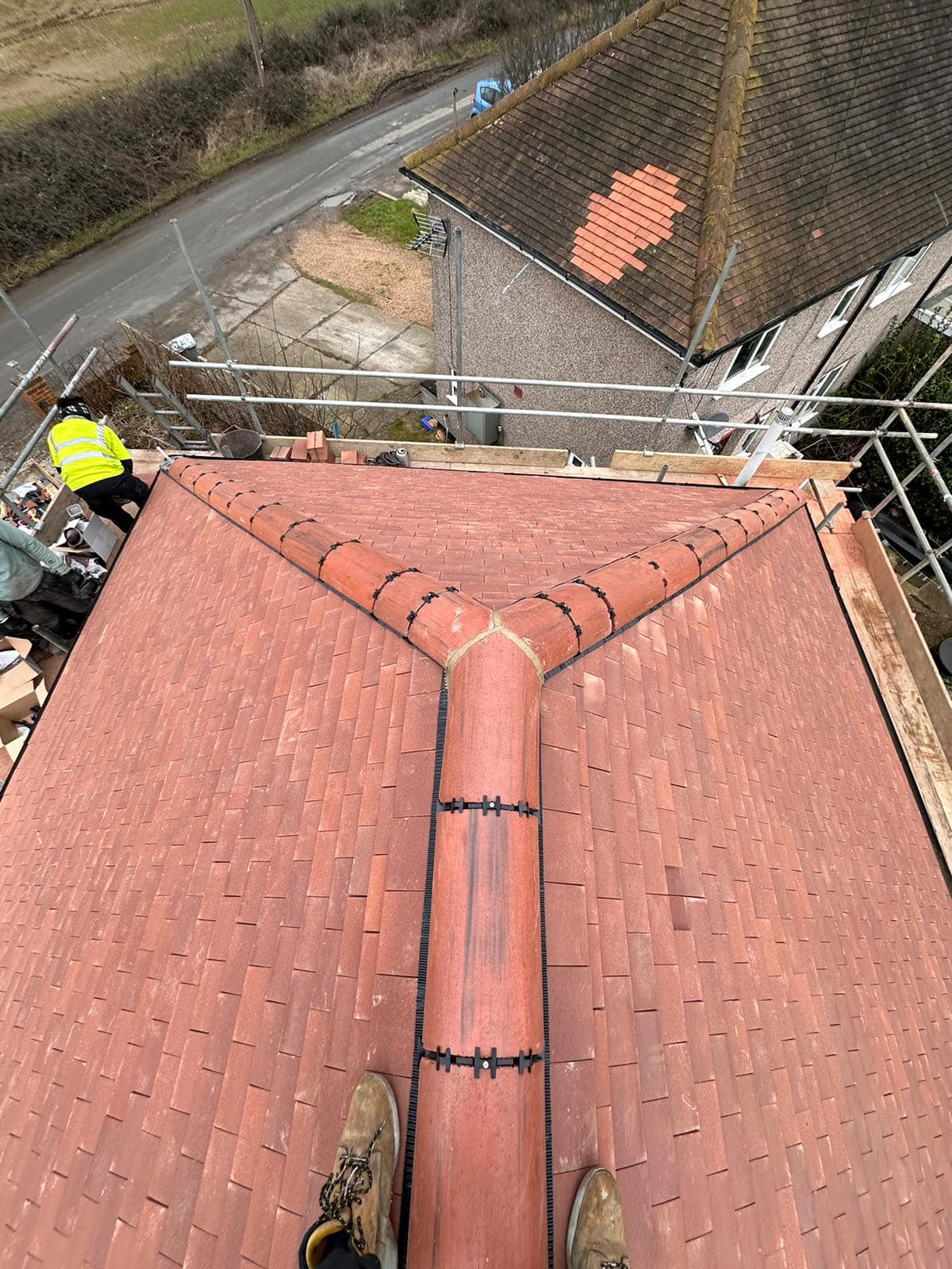 Professional roofers working on a property in London - KS Roof Master