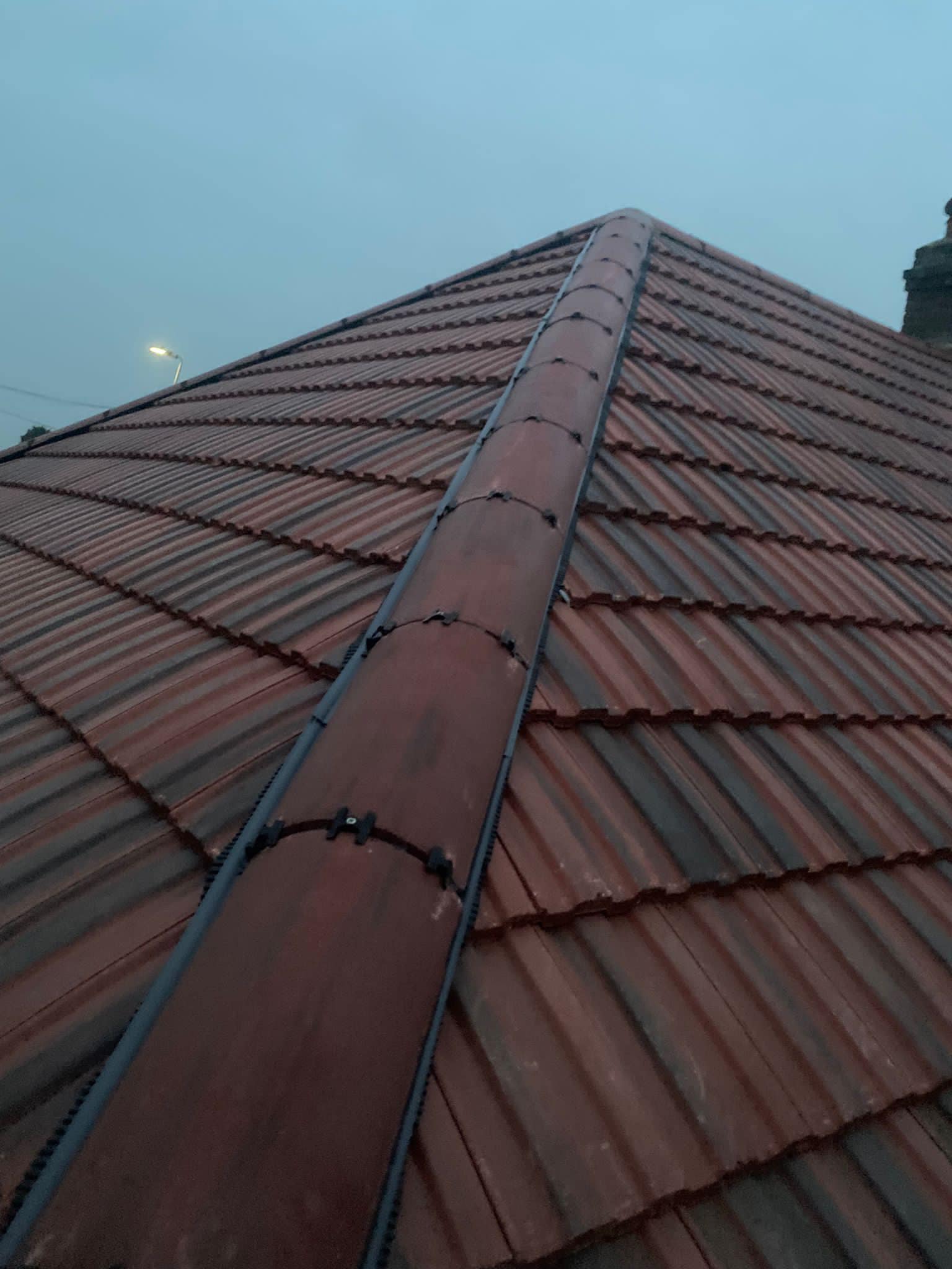 Professional roofers working on a property in London - KS Roof Master