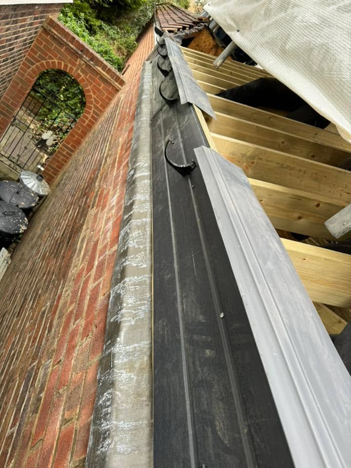 Professional roofers working on a property in London - KS Roof Master