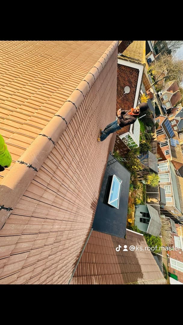 Professional roofers working on a property in London - KS Roof Master