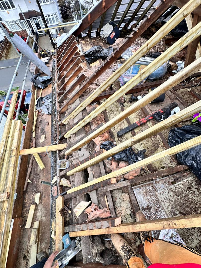 Professional roofers working on a property in London - KS Roof Master