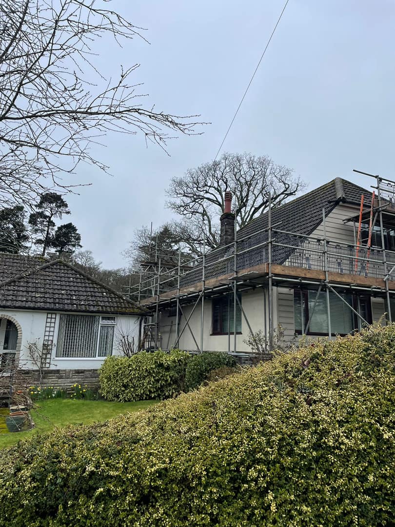 Professional roofers working on a property in London - KS Roof Master
