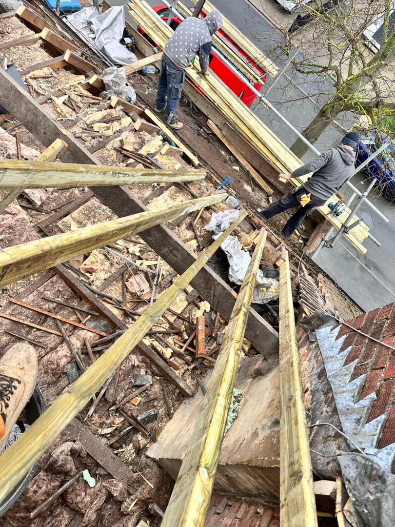 Professional roofers working on a property in London - KS Roof Master