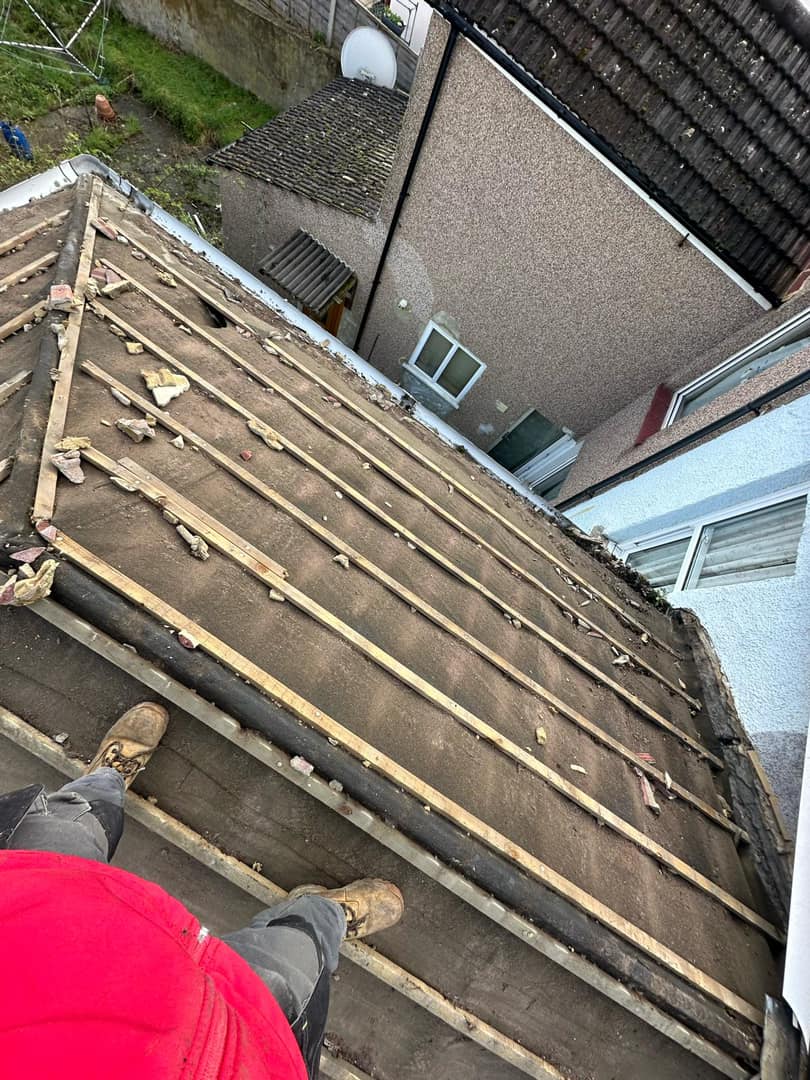 Professional roofers working on a property in London - KS Roof Master