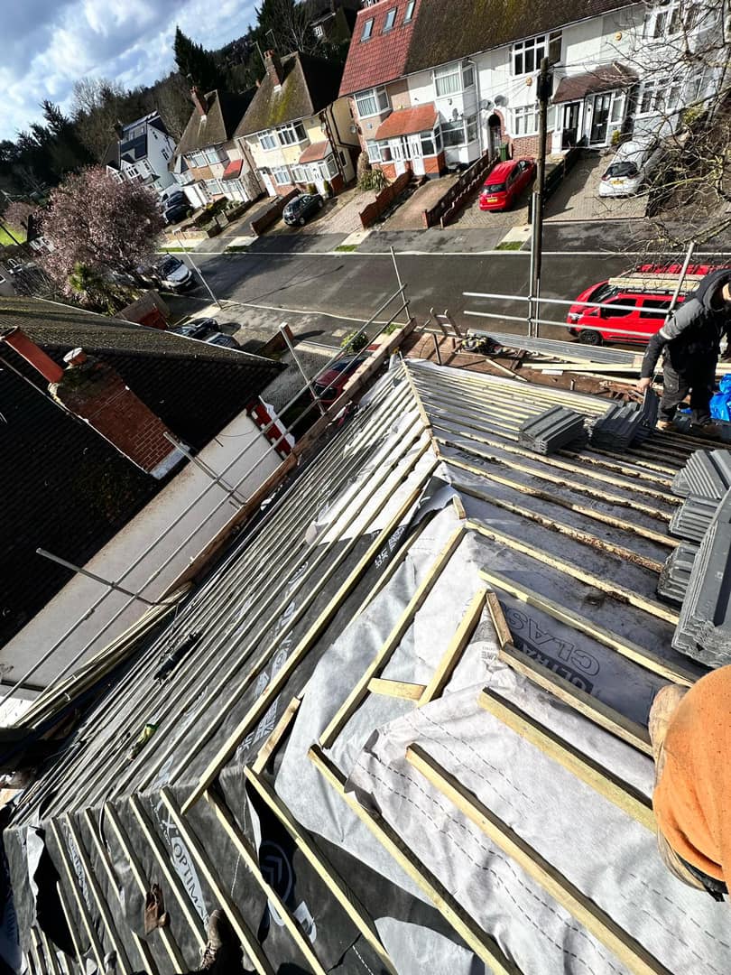 Professional roofers working on a property in London - KS Roof Master