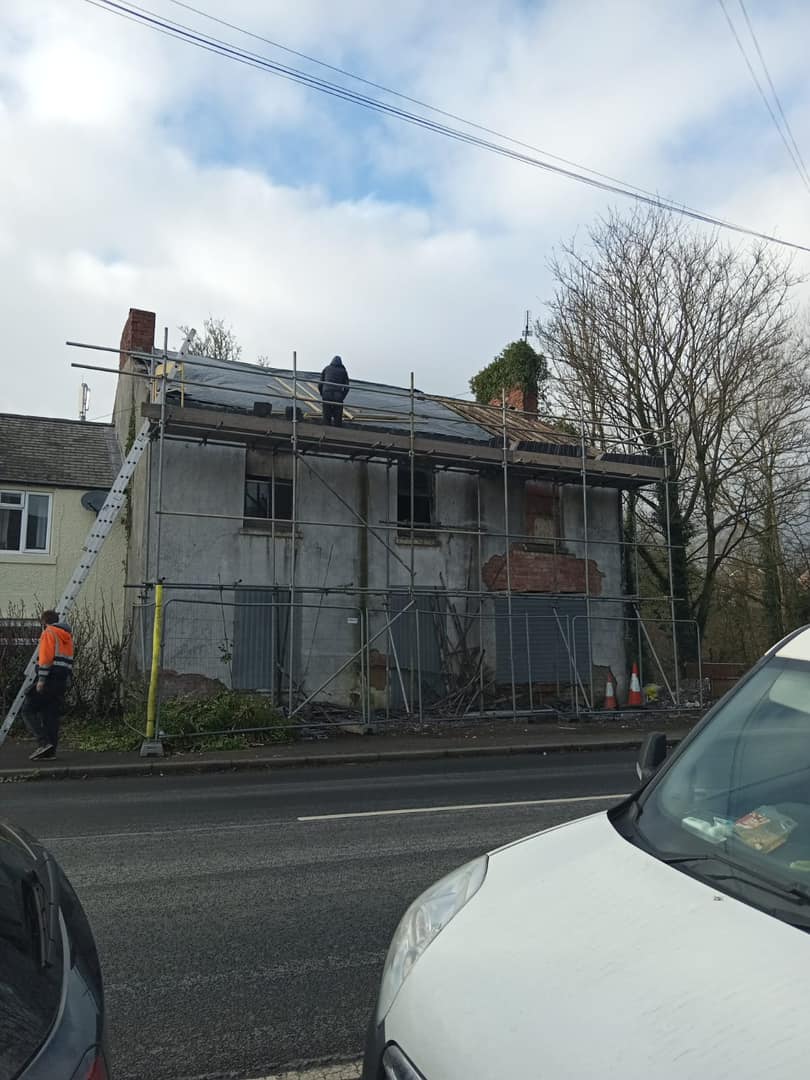 Professional roofers working on a property in London - KS Roof Master