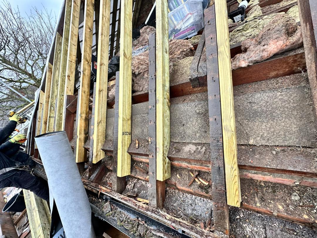 Professional roofers working on a property in London - KS Roof Master