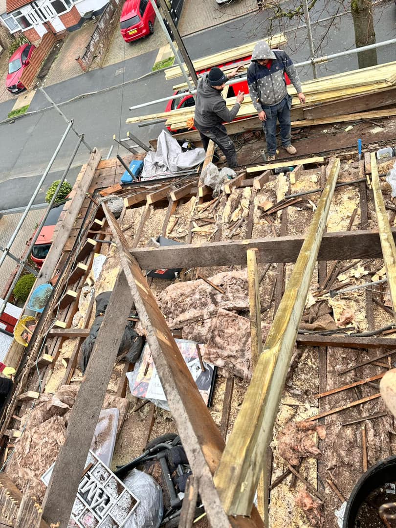 Professional roofers working on a property in London - KS Roof Master