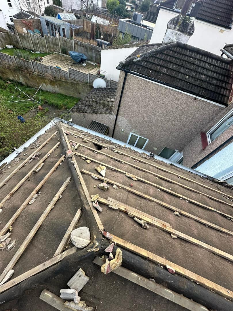 Professional roofers working on a property in London - KS Roof Master
