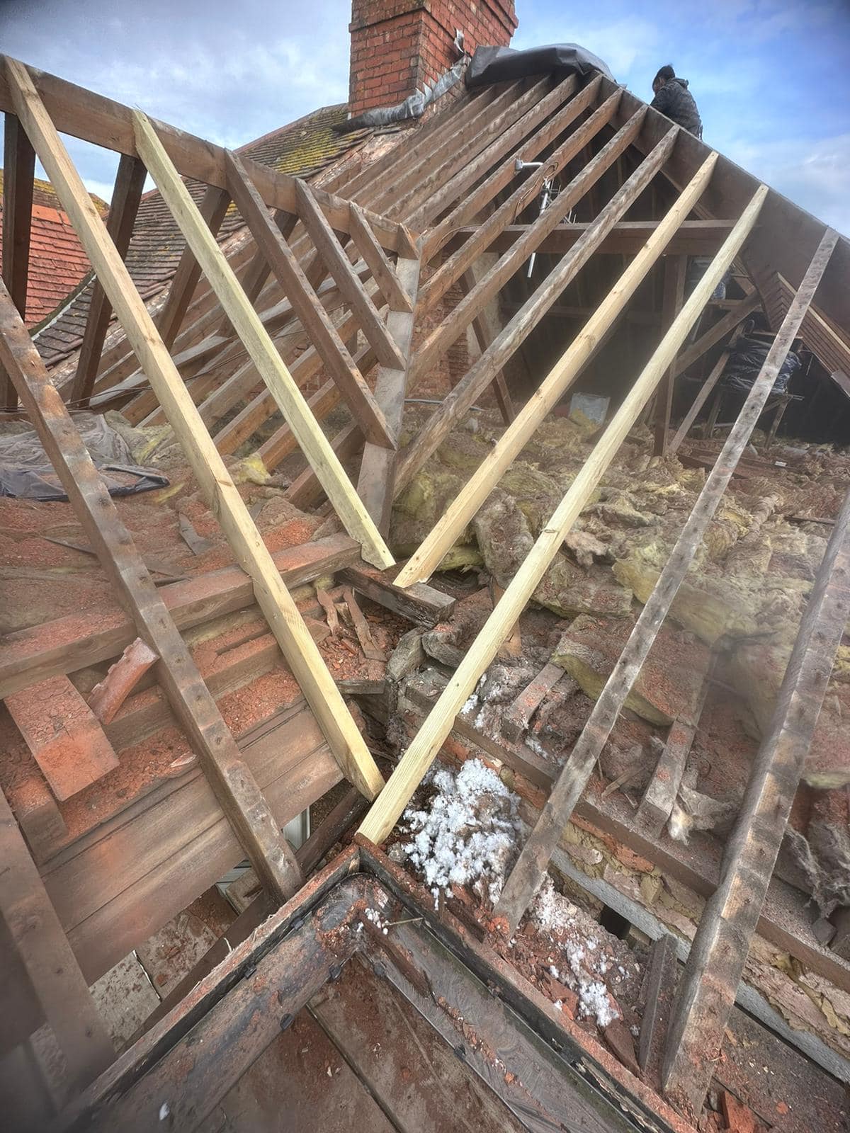 Professional roofers working on a property in London - KS Roof Master